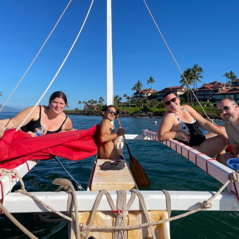 a group of people on a boat