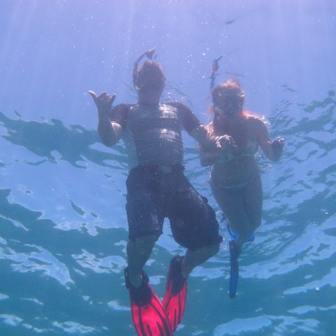 a man swimming in the water
