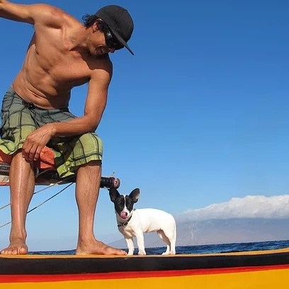 a man riding on the back of a boat