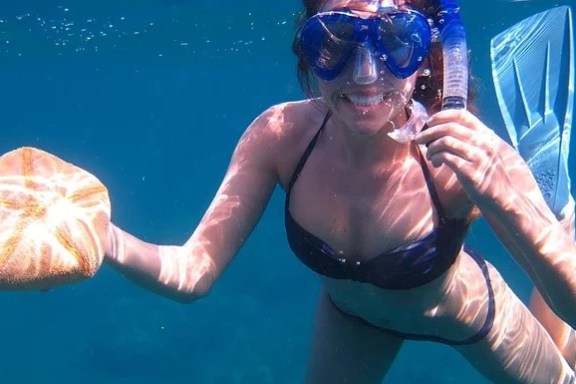 a person swimming in the water