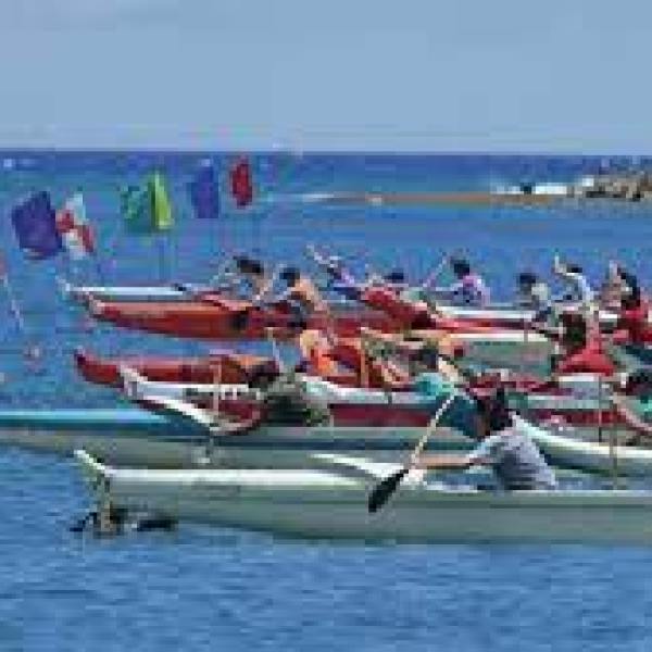 a group of people in a body of water